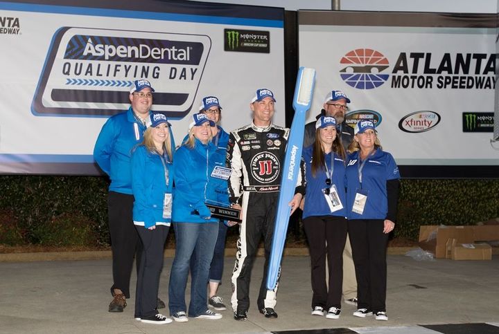 Kevin Harvick edged Ryan Newman for the pole position during Aspen Dental Qualifying Day on Friday at Atlanta Motor Speedway.