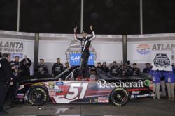 Kyle Busch's victory in Saturday's Ultimate Tailgating 200 at Atlanta Motor Speedway enabled the veteran to surpass Ron Hornaday as the winningest driver in NASCAR Gander Outdoors Truck Series competition.