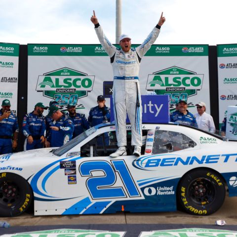 Austin Hill celebrates after winning Saturday's Alsco Uniforms 250 NASCAR Xfinity Series race at Atlanta Motor Speedway.