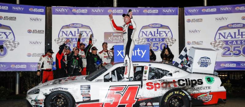 Ty Gibbs celebrates his victory in the Nalley Cars 250 at Atlanta Motor Speedway on March 19, 2022.