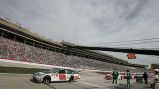 Dale Earnhardt Jr. leads the field off pit road in 2010 in a race in which he won the pole position for.
