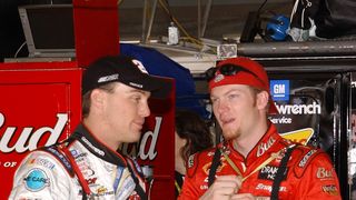 Dale Earnhardt Jr. and Kevin Harvick chat in between practices in 2002.